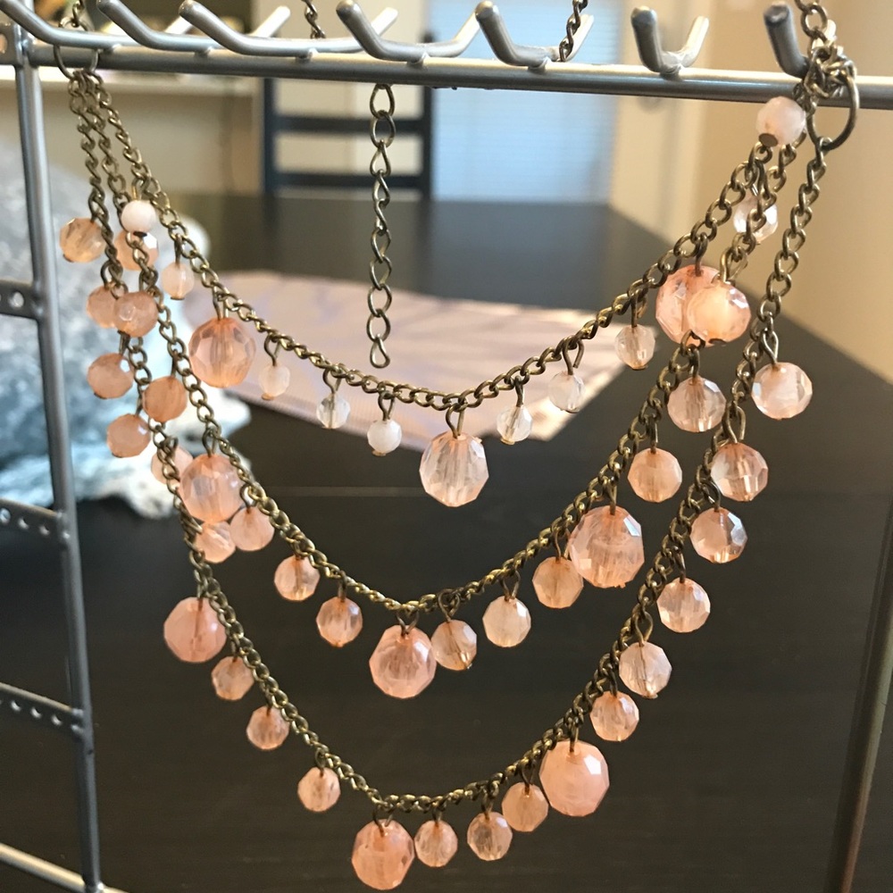 Three tiered coral beaded necklace